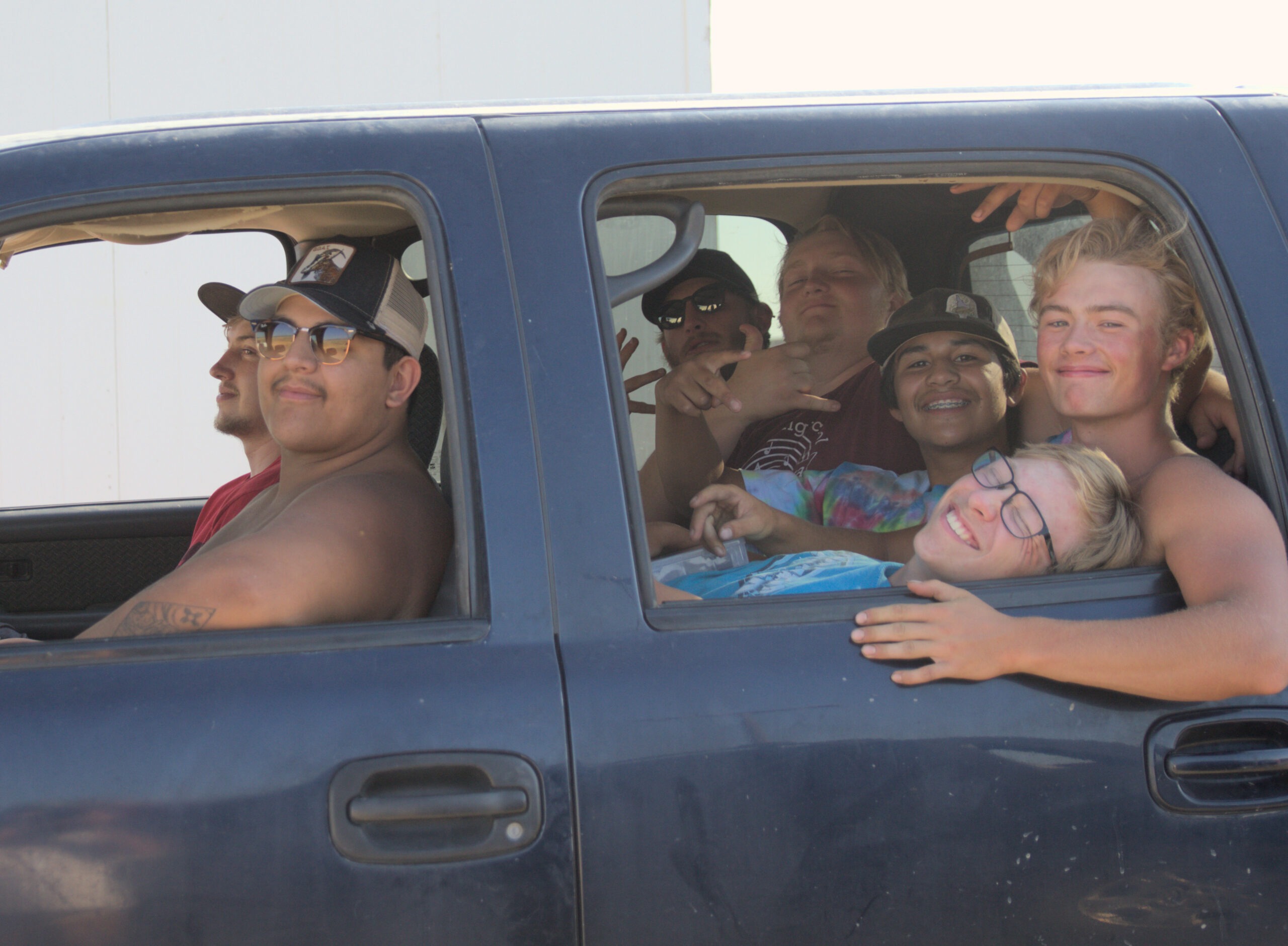 7 roguers in the back of a pick up truck.